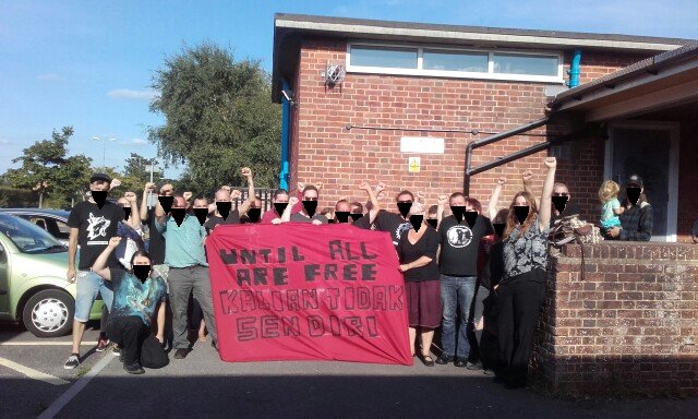 Until all are free and Kalian Tidak Sendiri (You are not alone) banner for imprisoned anarchists in Indonesia taken at the 2nd Dorset Radical Bookfair on 4th August 2018