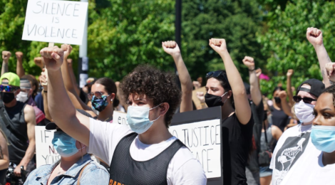 a group of black lives matter protesters, black people at the front